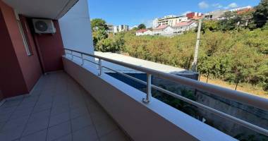 a vendre - appartement t3 de 51 m2 avec varangue parking fermé-secteur sainte-clotilde