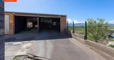a louer- st pierre-local commercial 120 m²+stationnements-zone industrielle-excellente visibilité